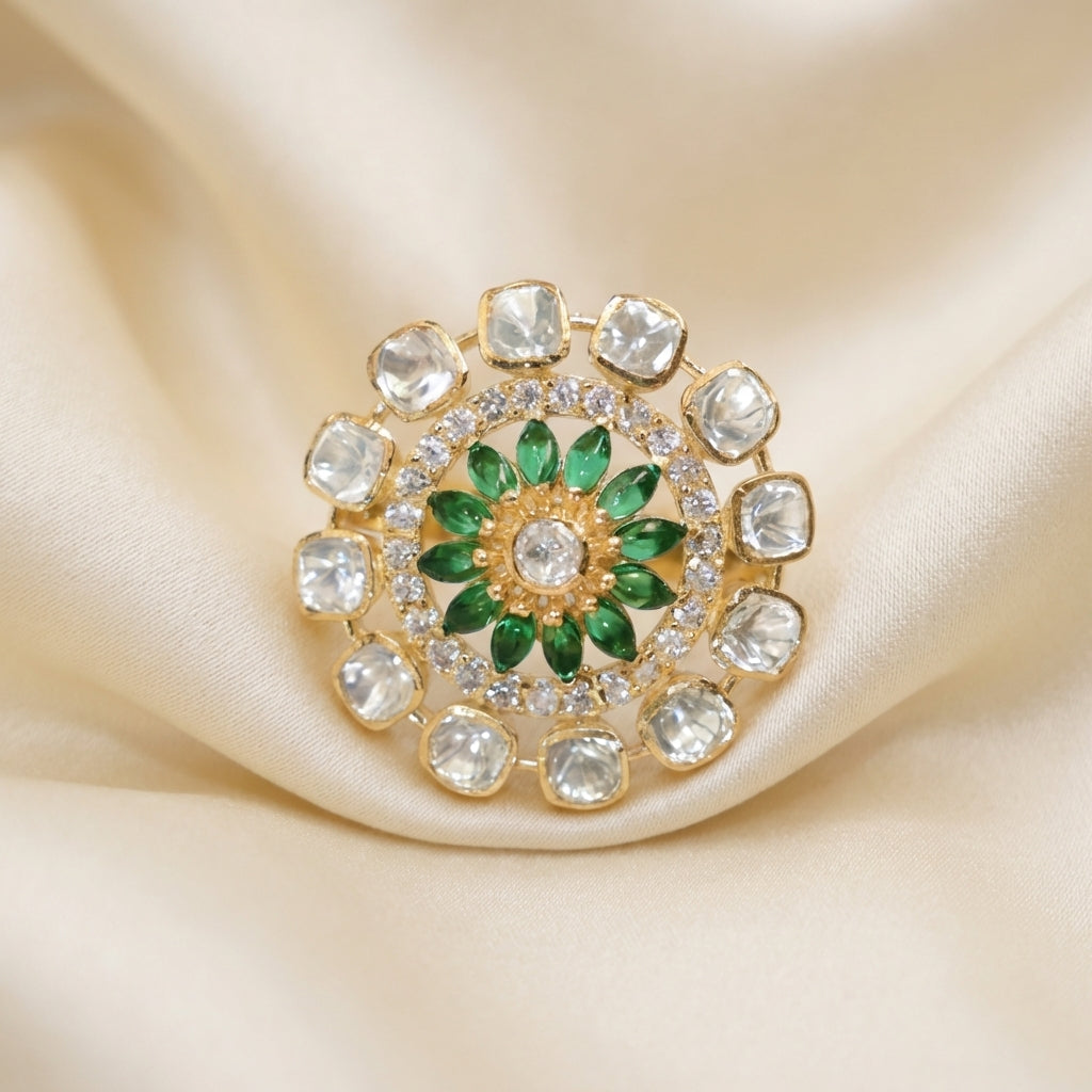 The ZEVARAZ Aabha Panna Bahaar Kundan Silver Ring styled on cream satin fabric