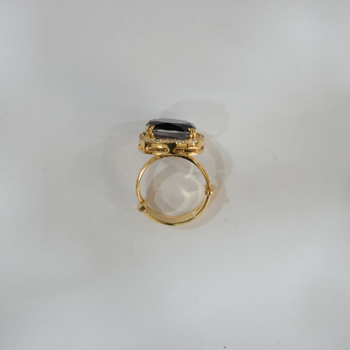 Detail studio shot of the gemstone setting on the ZEVARAZ Ratna Jamuni Chand Silver Ring