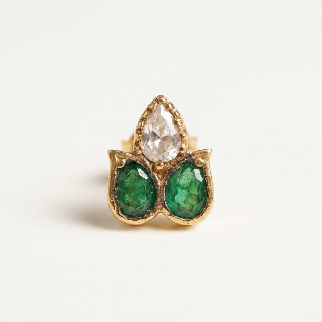 ZEVARAZ Aabha Aasha Studs, close detail of the green and clear pear-cut stones
