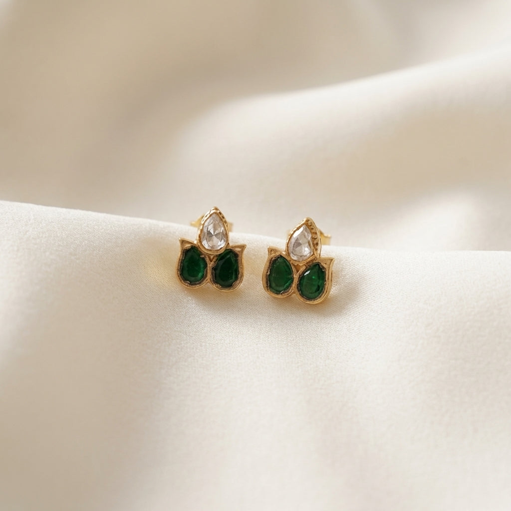 ZEVARAZ Aabha Aasha Studs photographed on cream silk