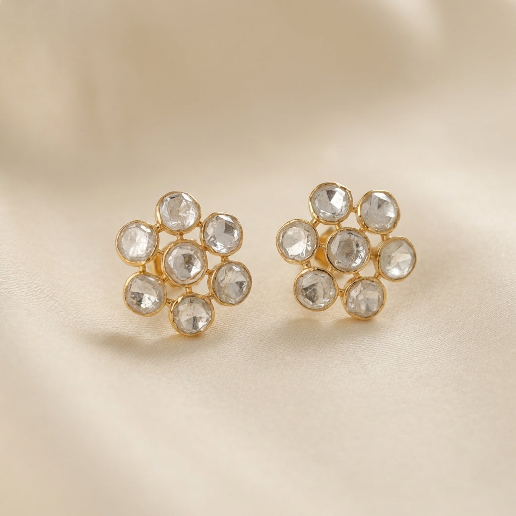 ZEVARAZ Aabha Jyoti Studs photographed on cream silk