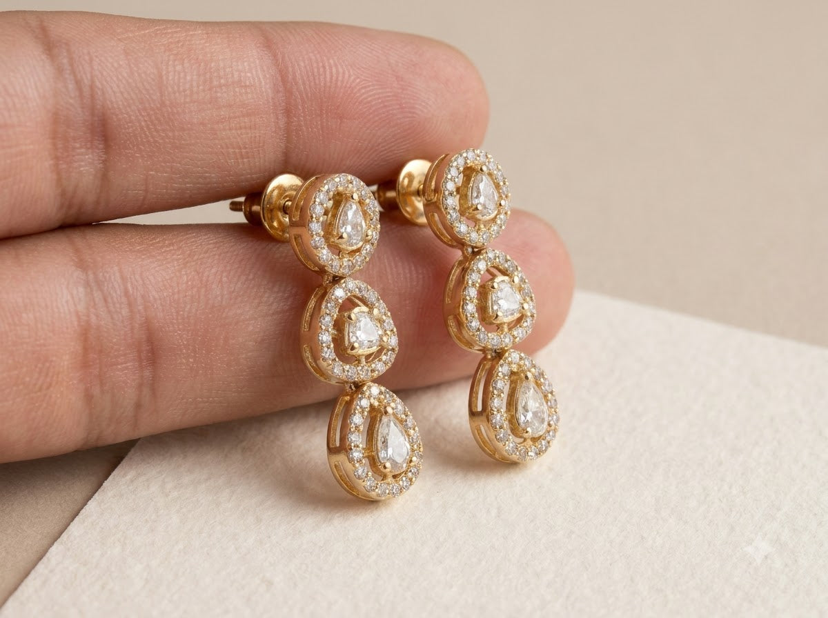 ZEVARAZ Aabha Aarohi Drops held in hand, showing the screw backs