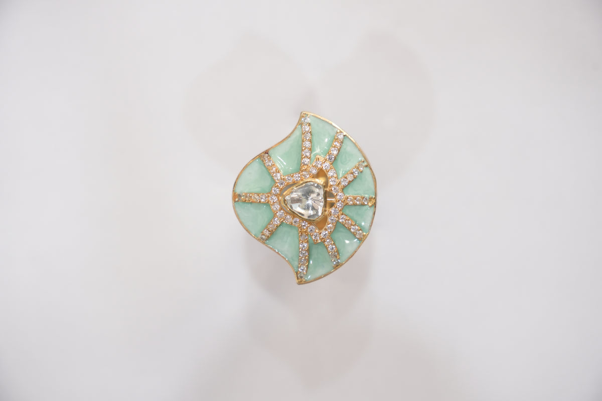 Studio photograph of the ZEVARAZ Ratna Harit Pankha Enamel Silver Ring showing the full band