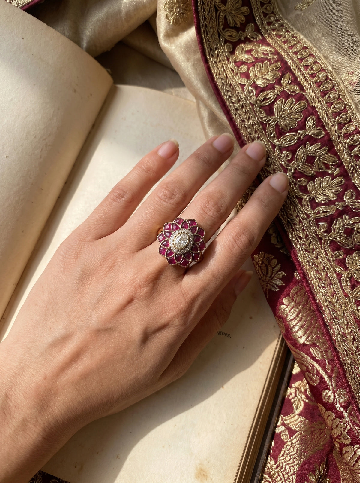 The ZEVARAZ Aabha Jamuni Kamal Kundan Silver Ring worn on a hand
