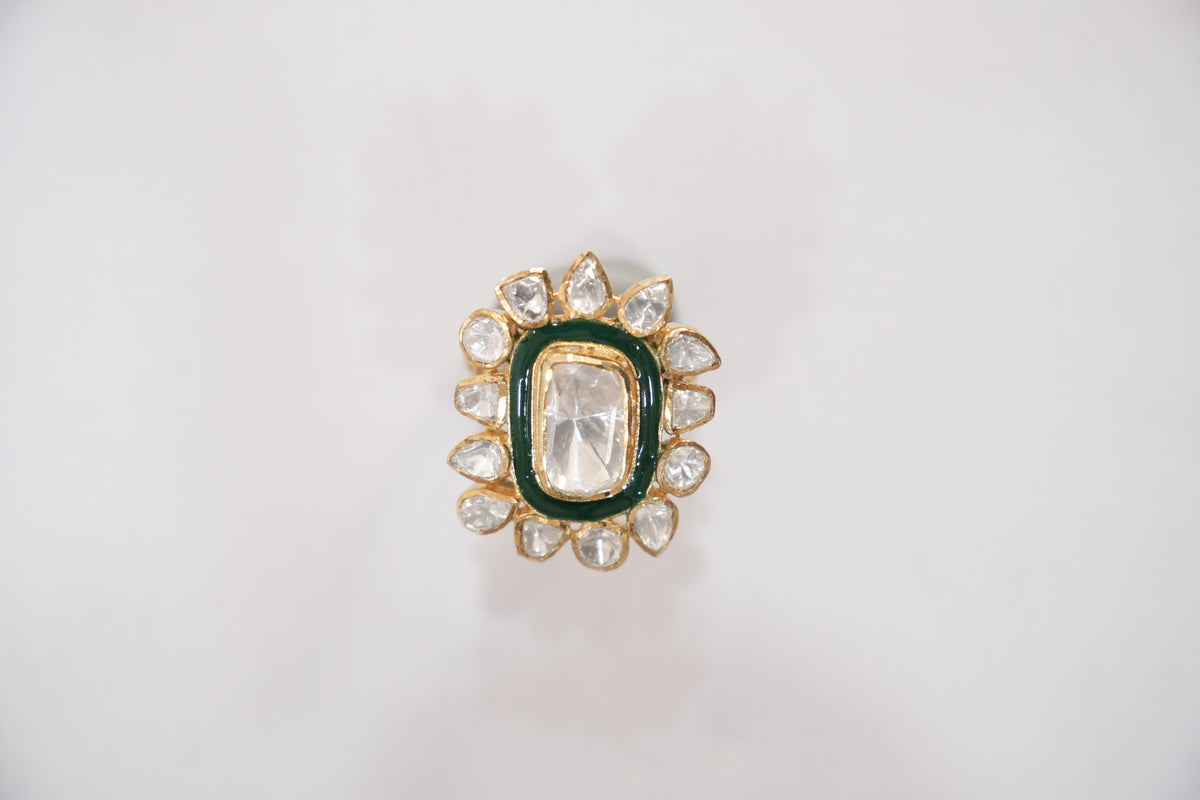 Studio photograph of the ZEVARAZ Aabha Harit Meena Kundan Silver Ring