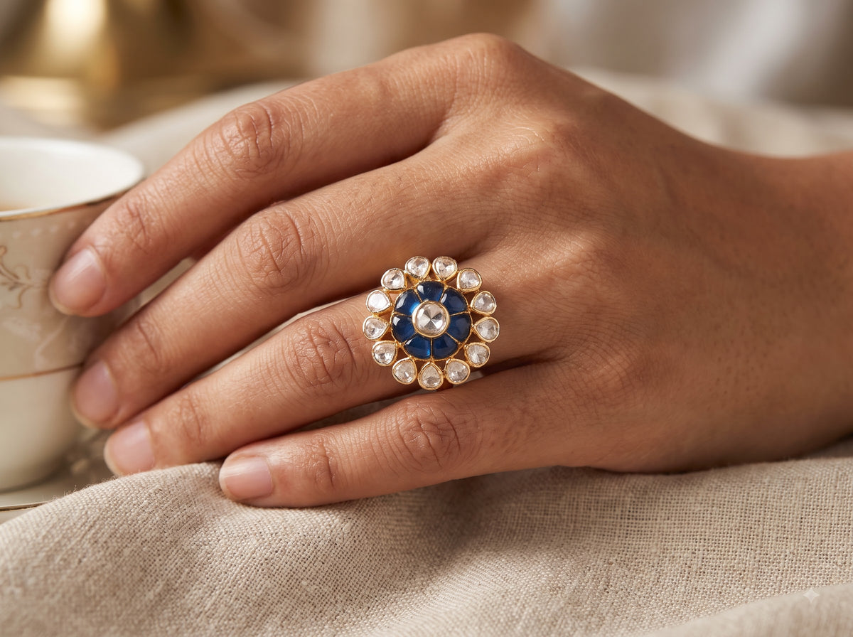 Top view of the floral polki setting on the ZEVARAZ Aabha Neelam Pushp Polki Silver Ring